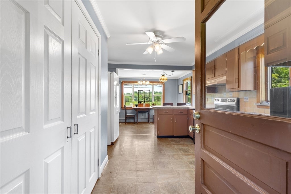 Nestled on over 2 acres, this Classic New England Cape offers the perf – image 3