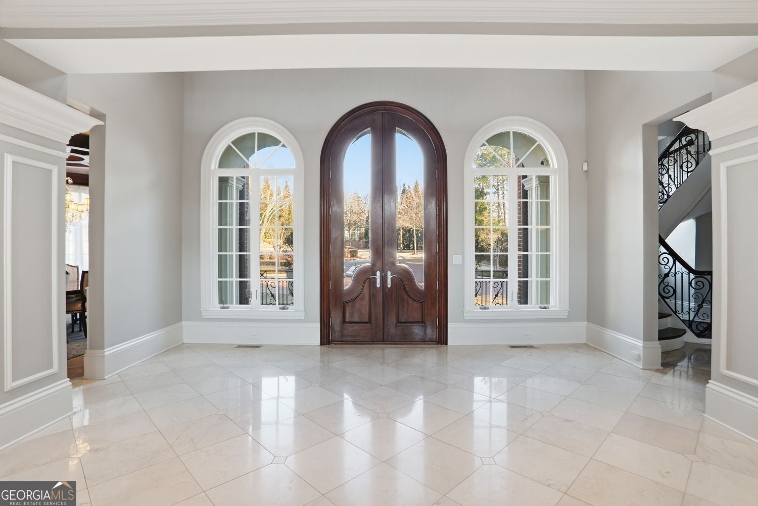 Set on 3.8 beautifully manicured acres, this elegant gated estate offe – image 79