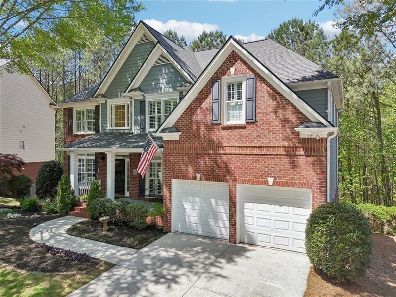 This beautiful home located on a cul-de-sac backs up to a private wood – image 62