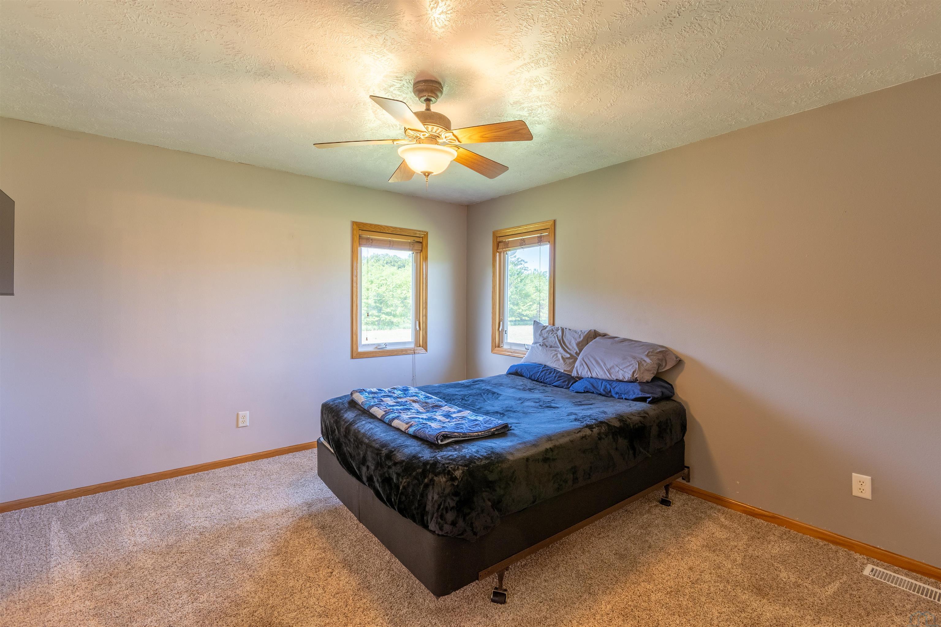 Tucked into just over 4.7 acres, this property delivers that rare mix – image 15