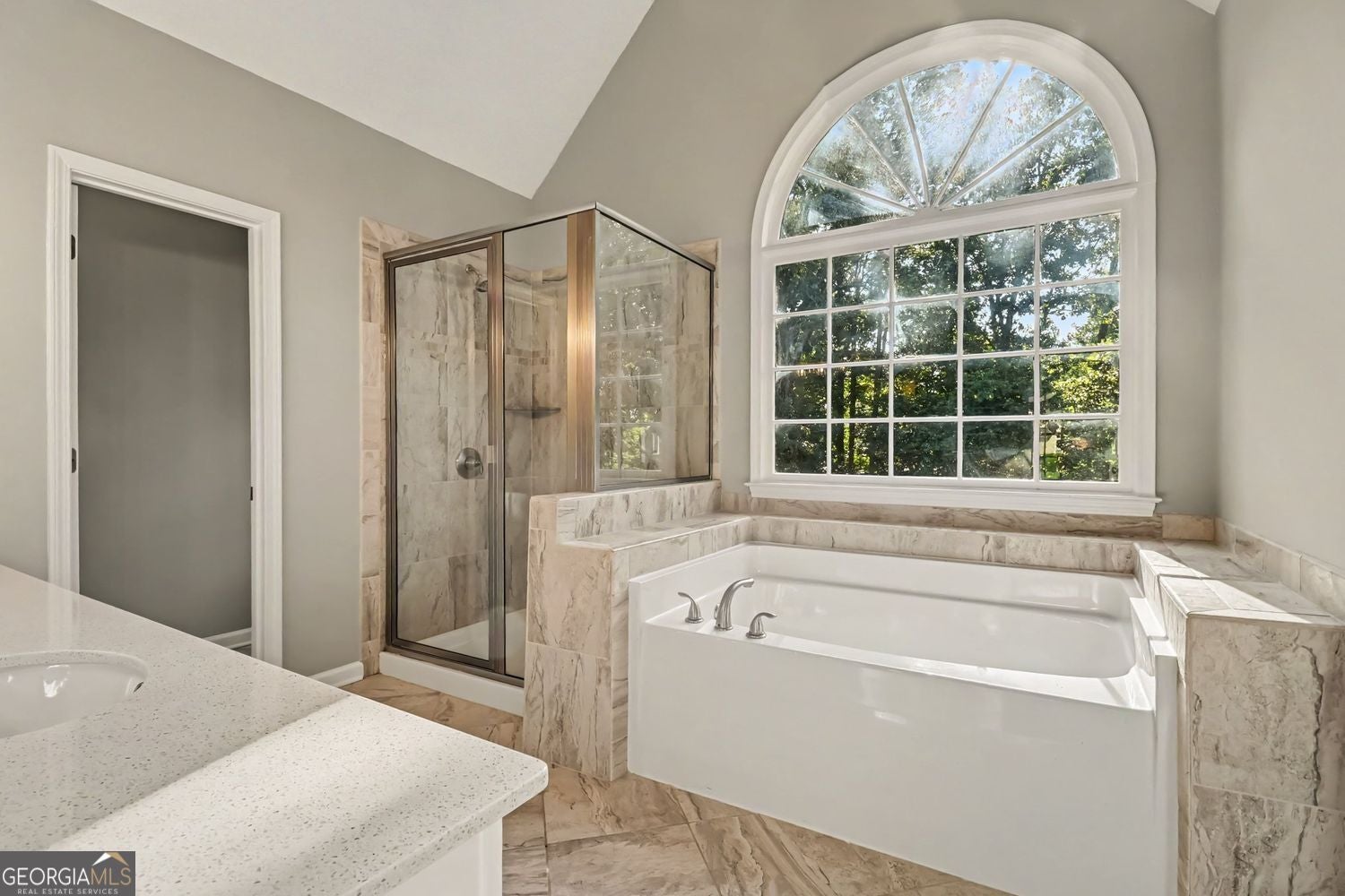 Welcome to a beautifully renovated home featuring a fully finished bas – image 26