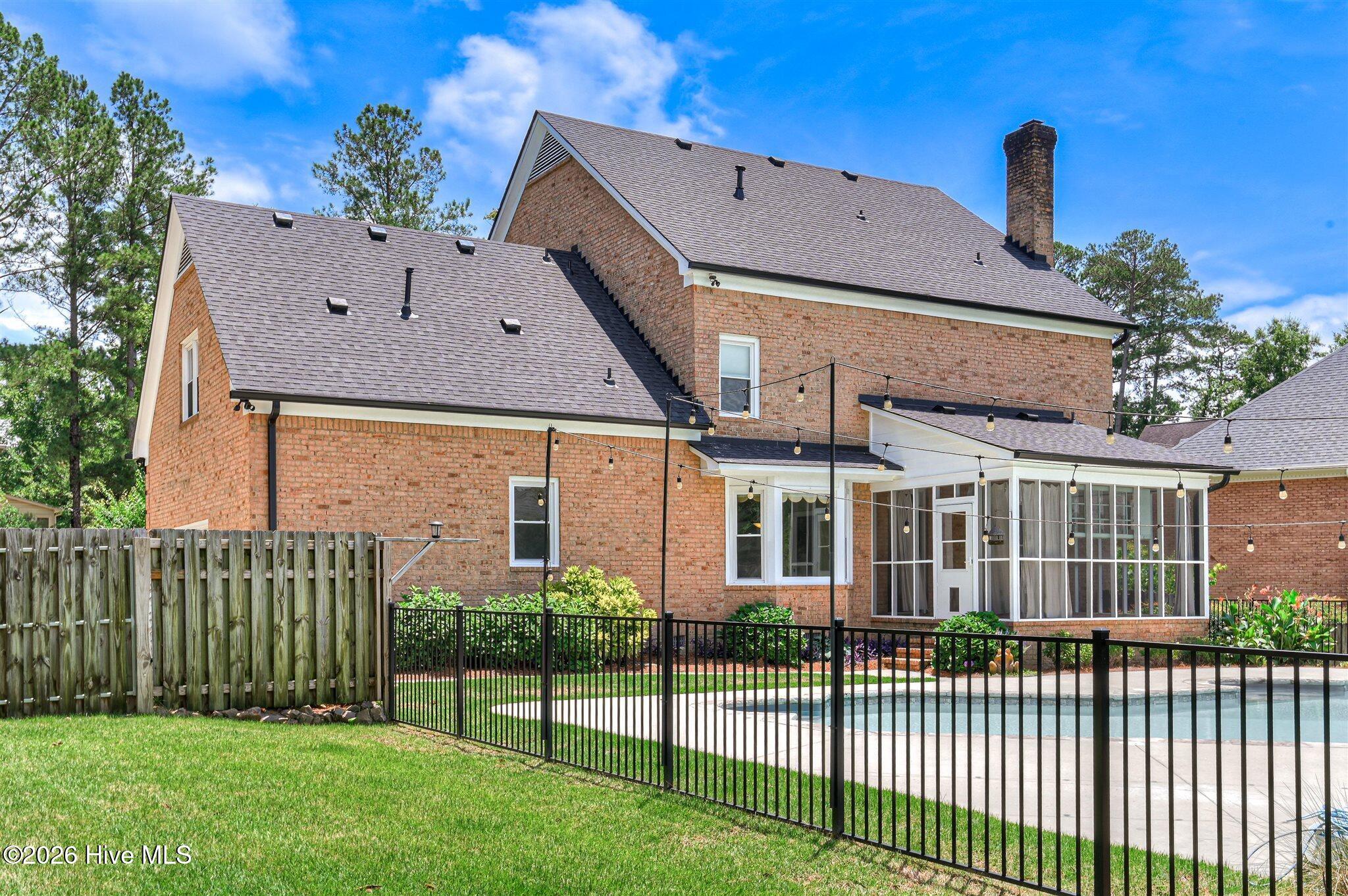 Welcome to this stunning brick home nestled on a quiet cul-de-sac in t – image 56