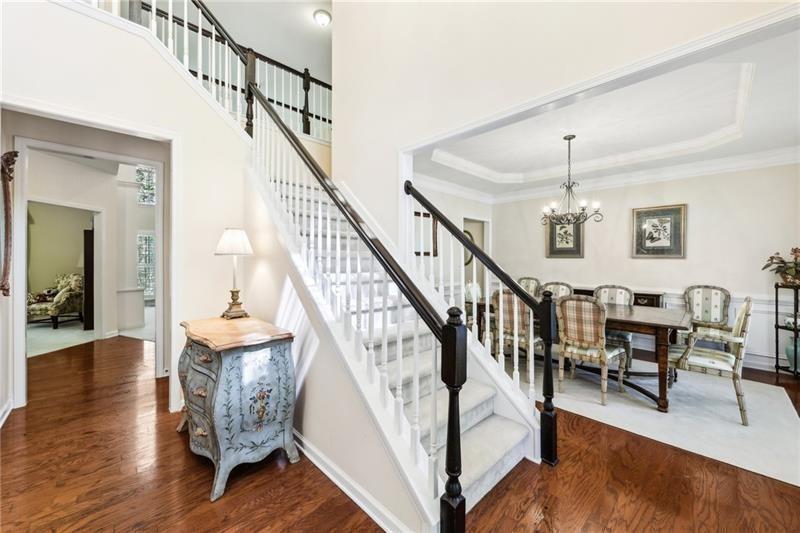 This beautiful home located on a cul-de-sac backs up to a private wood – image 6