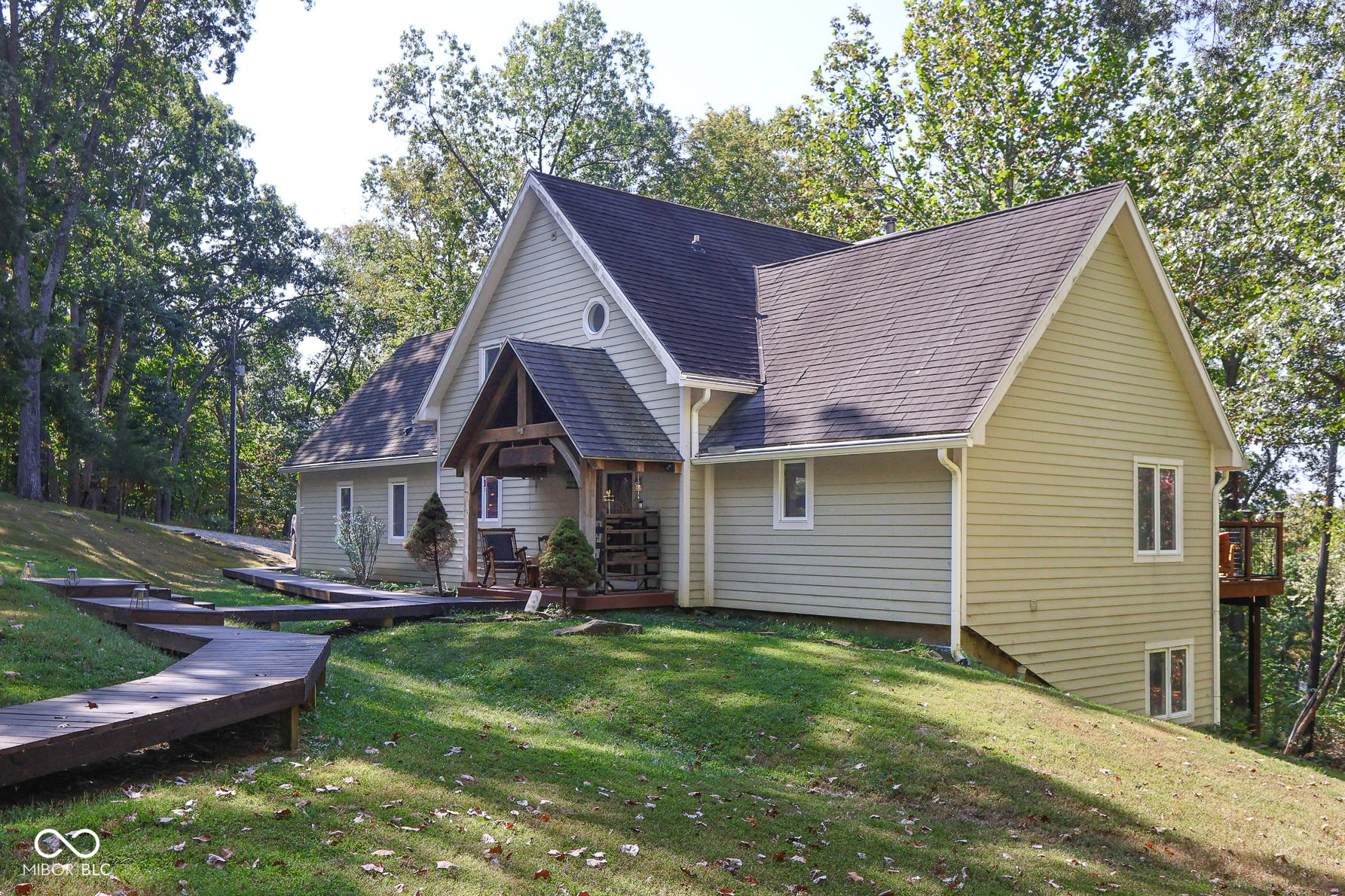 Custom red oak timber-frame home with Lake Monroe views, located in Sa – image 1