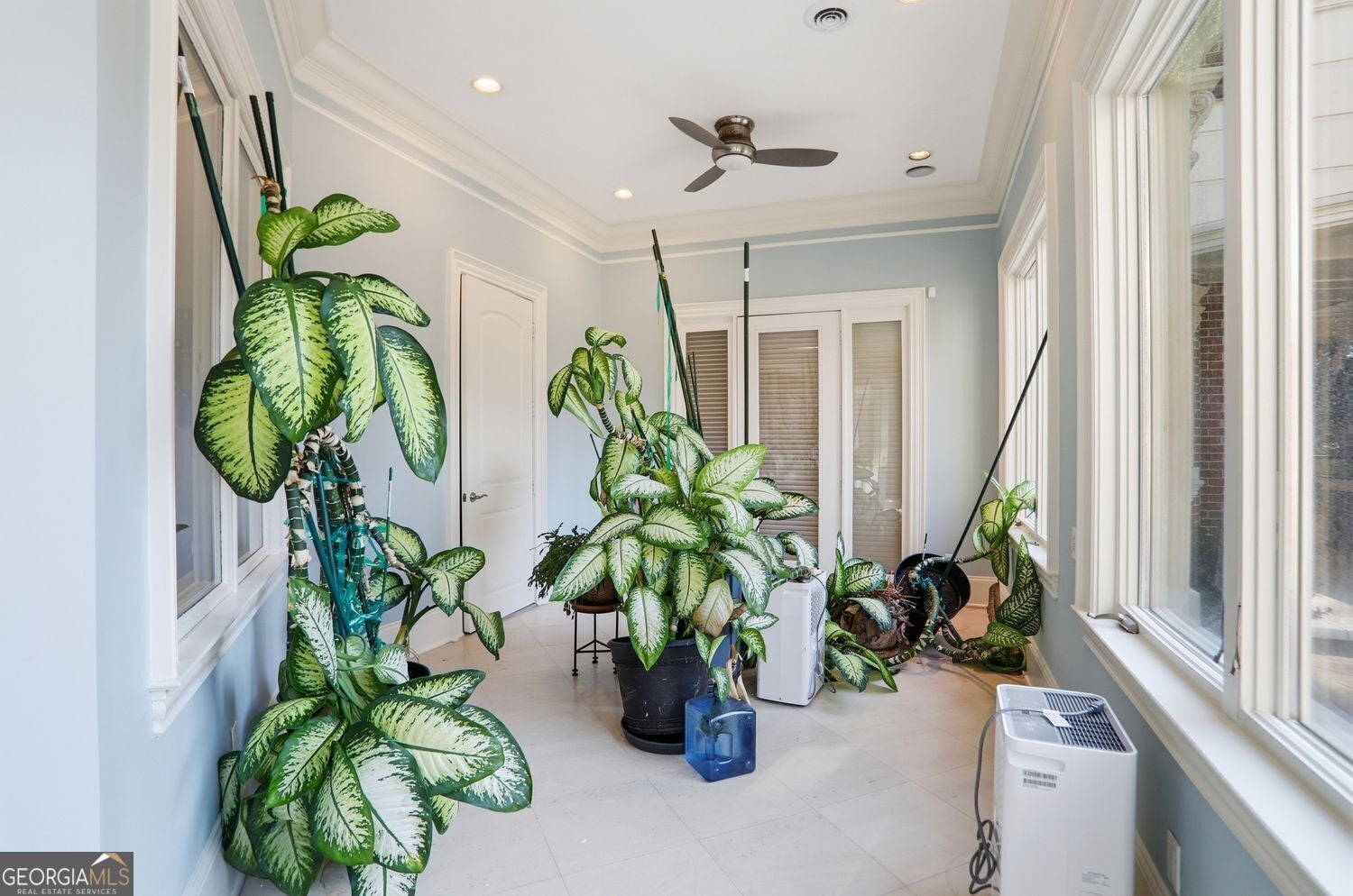 Set on 3.8 beautifully manicured acres, this elegant gated estate offe – image 147