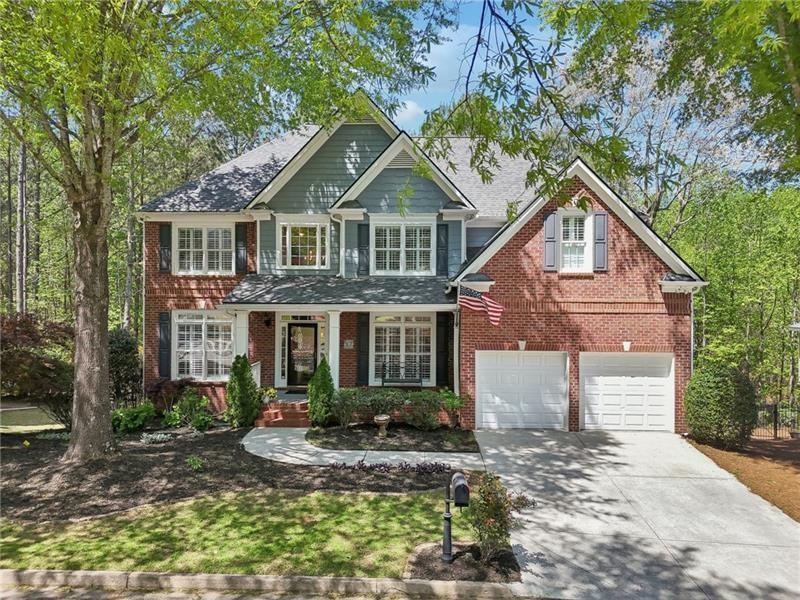 This beautiful home located on a cul-de-sac backs up to a private wood – image 60