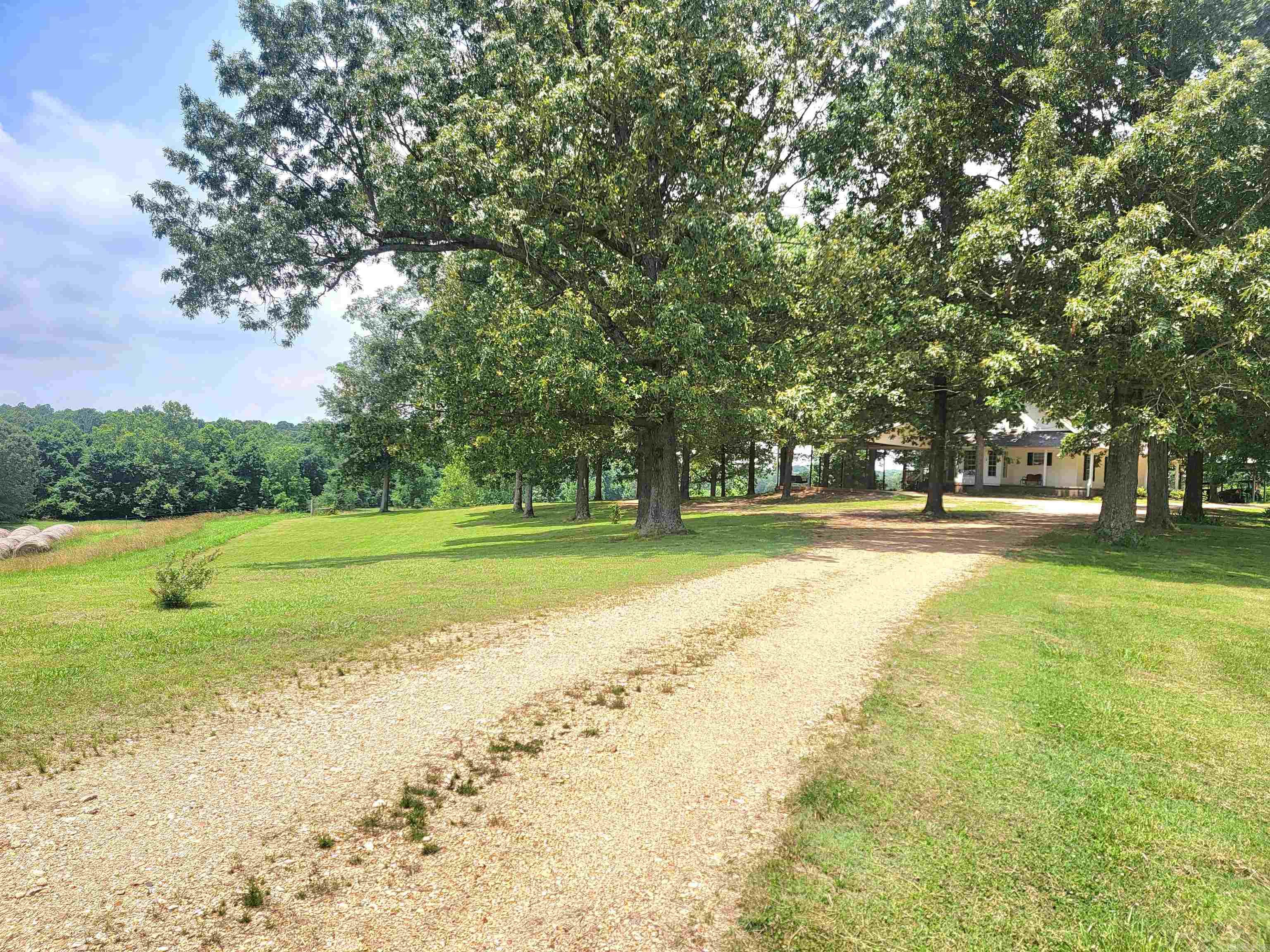 Turn North off of Hwy 412 West onto 609 Road. Follow around sharp curv – image 42