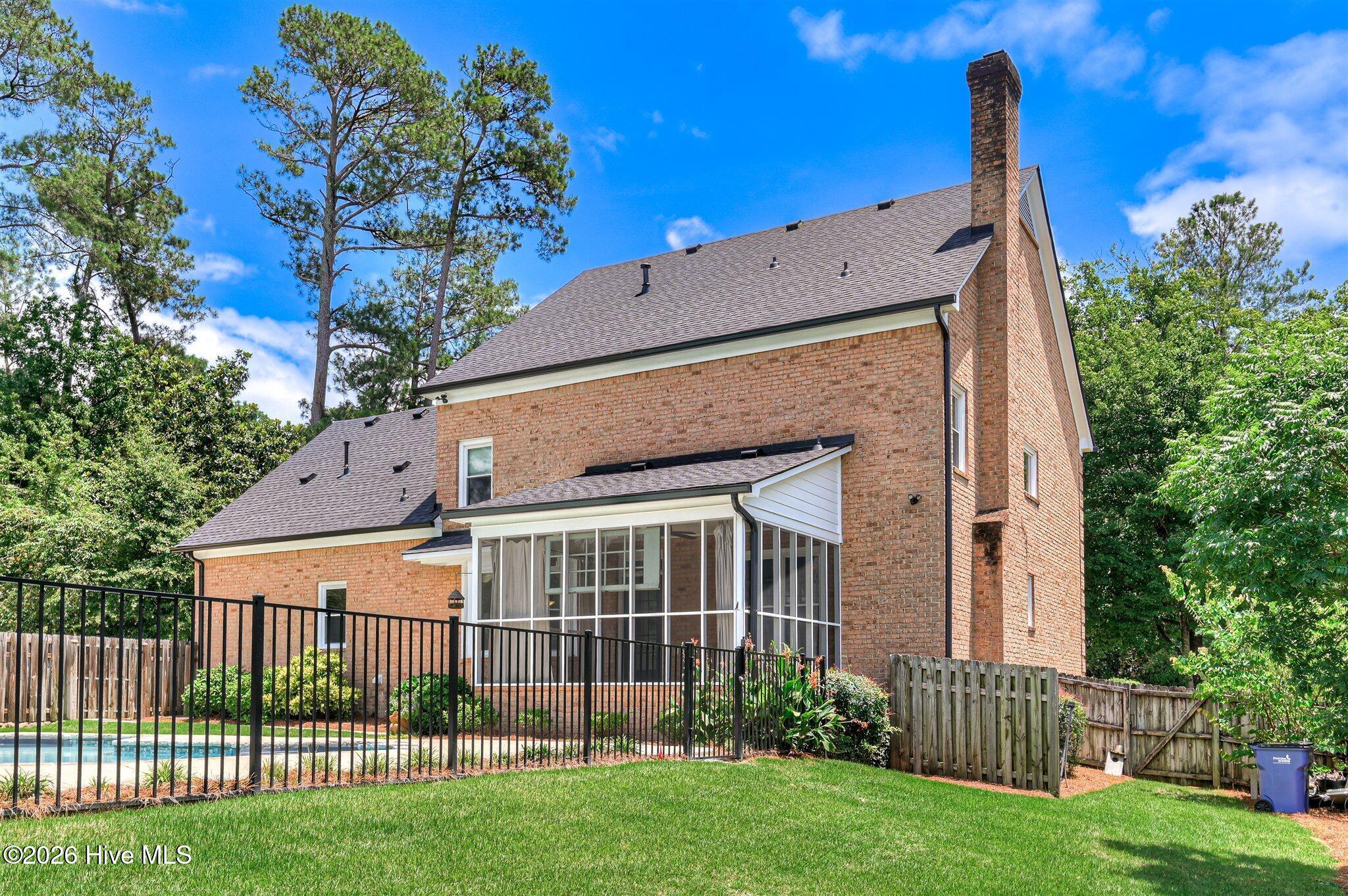 Welcome to this stunning brick home nestled on a quiet cul-de-sac in t – image 57