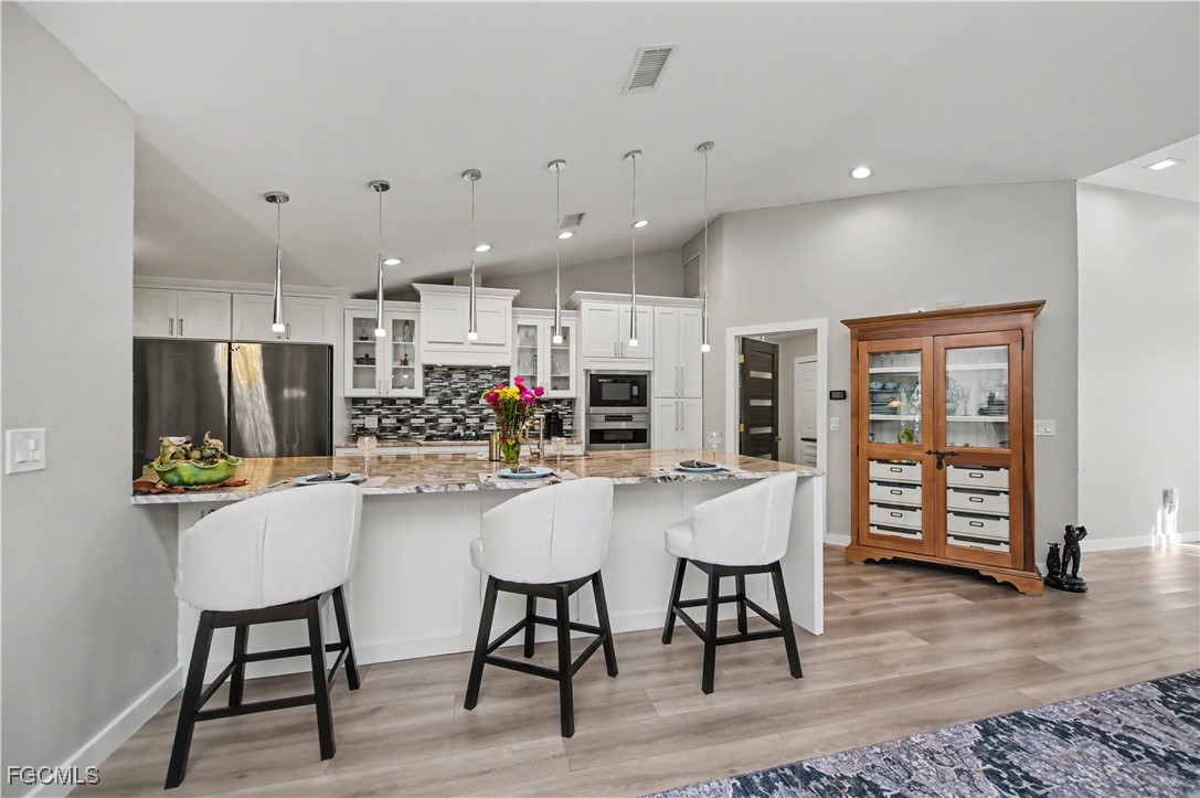 Welcome to your future GULF ACCESS HIDDEN GEM OF A home in the charmin – image 18