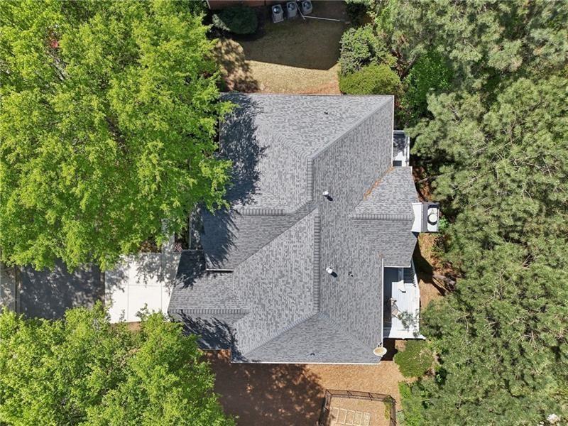 This beautiful home located on a cul-de-sac backs up to a private wood – image 65