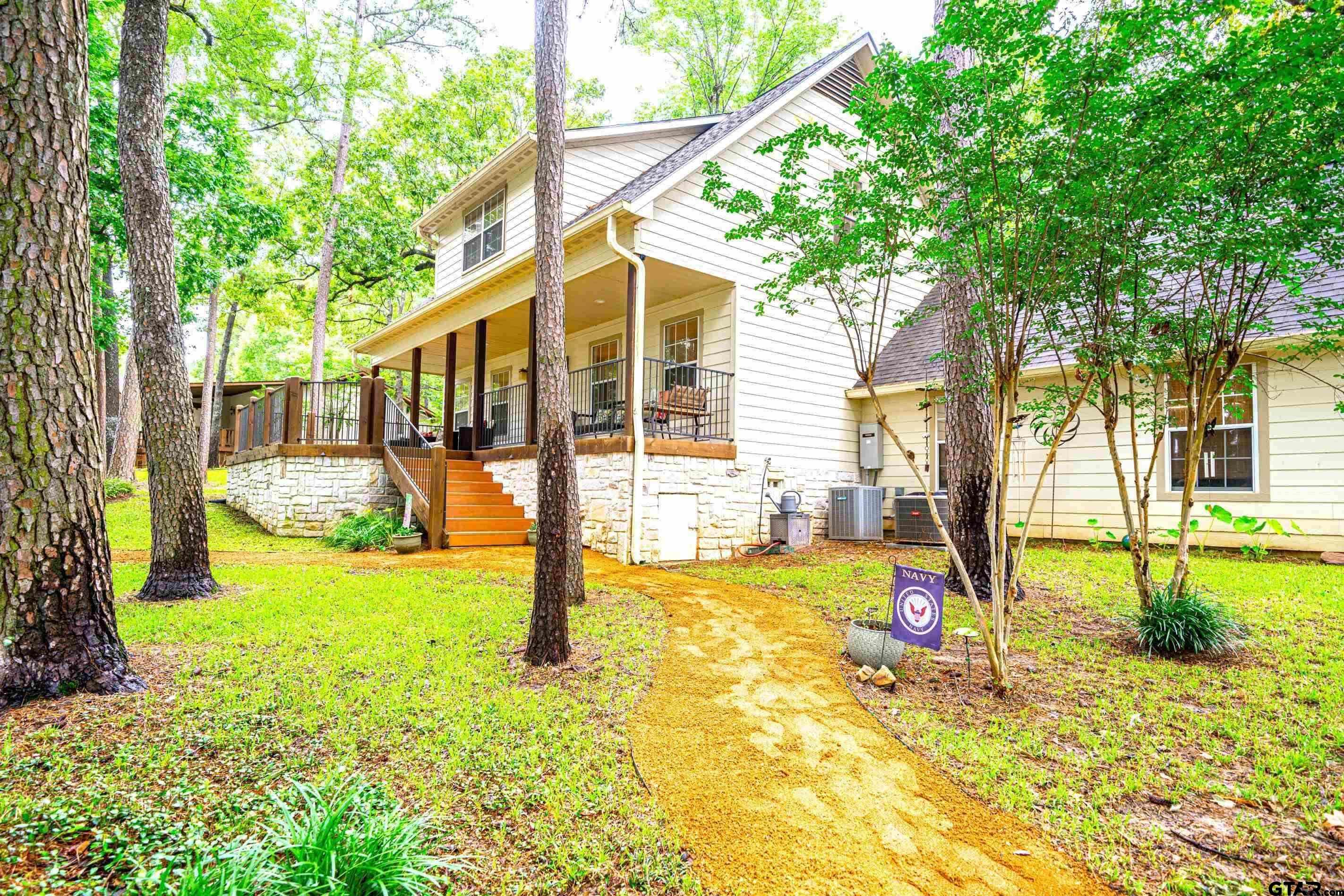 Located in the sought-after Tall Tree subdivision just across the stre – image 2