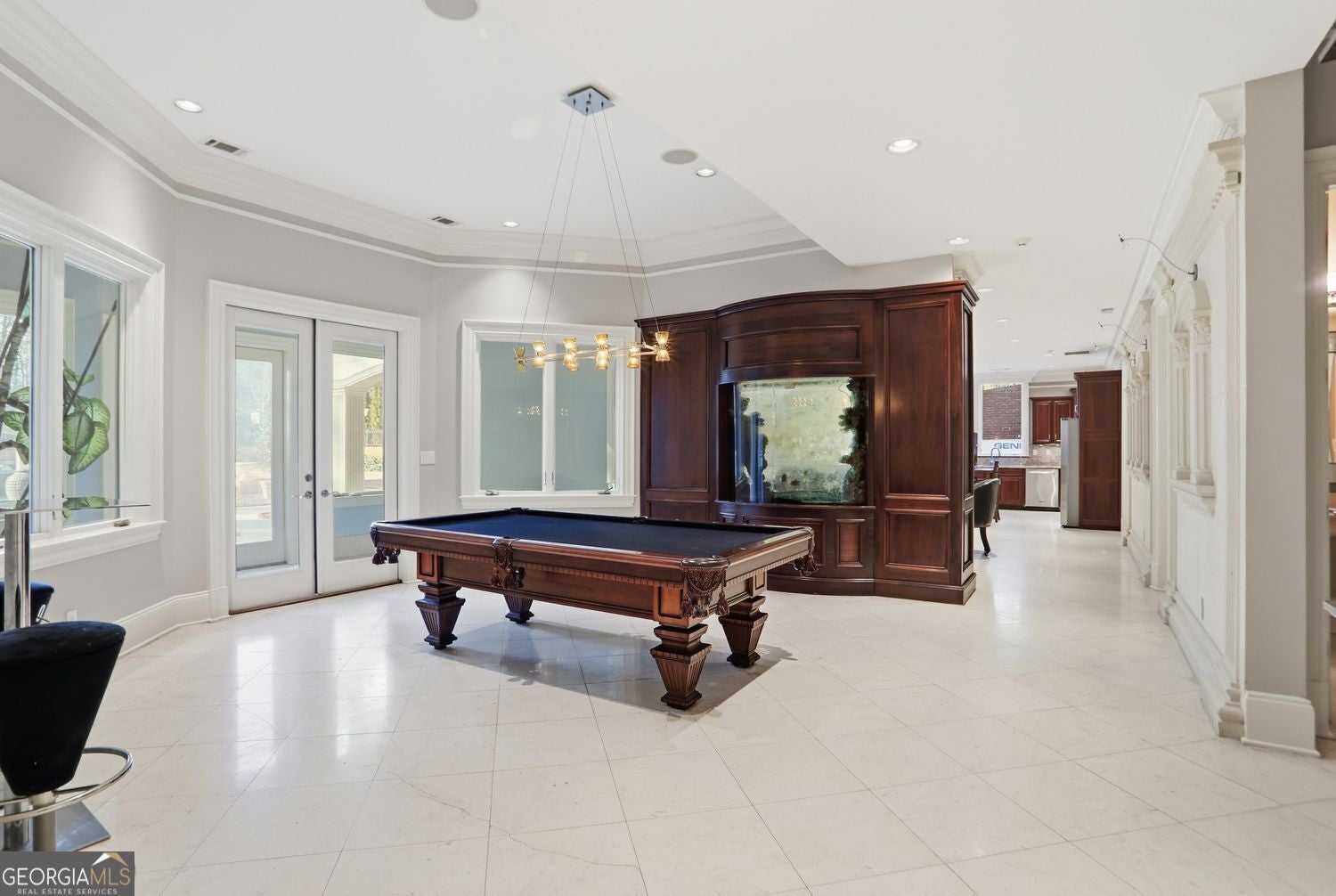 Set on 3.8 beautifully manicured acres, this elegant gated estate offe – image 125