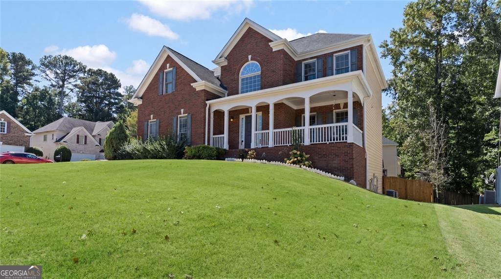 Just listed in the sought-after Arbors at Old Peachtree subdivision! T – image 3