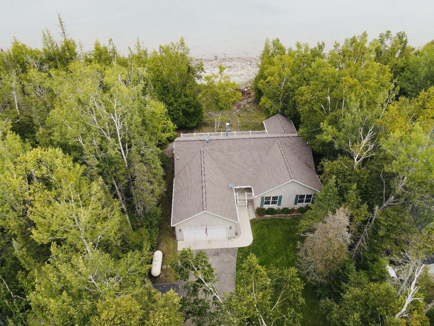 This one-owner ranch home on Lake Huron offers a perfect blend of comf – image 44