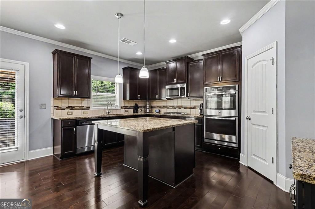 Location, location for this one, so close to the Mall of Georgia with – image 16
