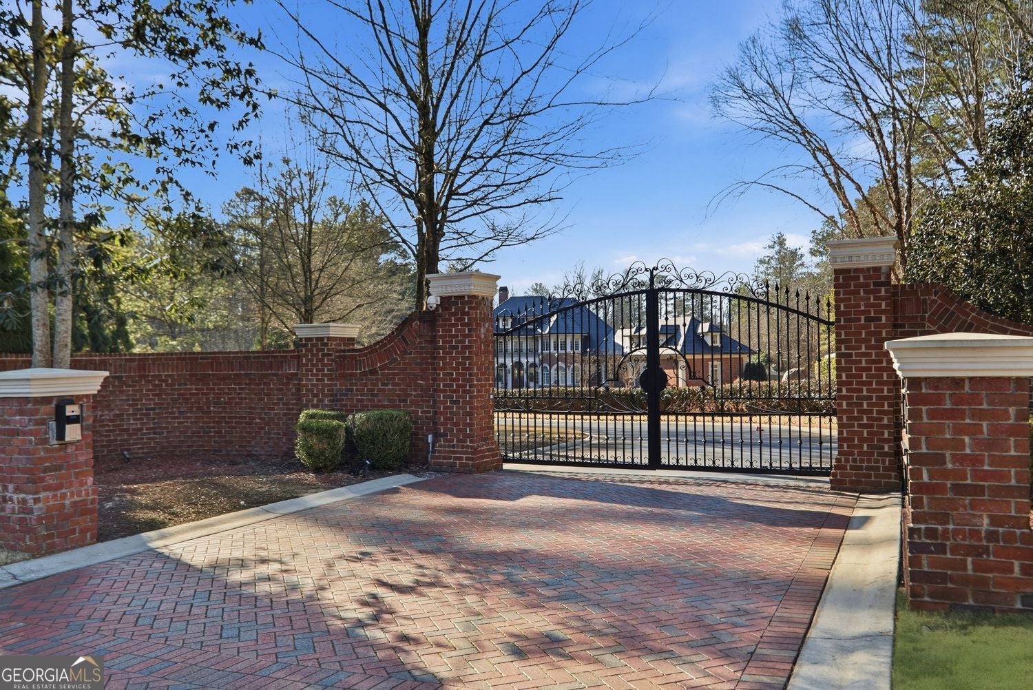 Set on 3.8 beautifully manicured acres, this elegant gated estate offe – image 150