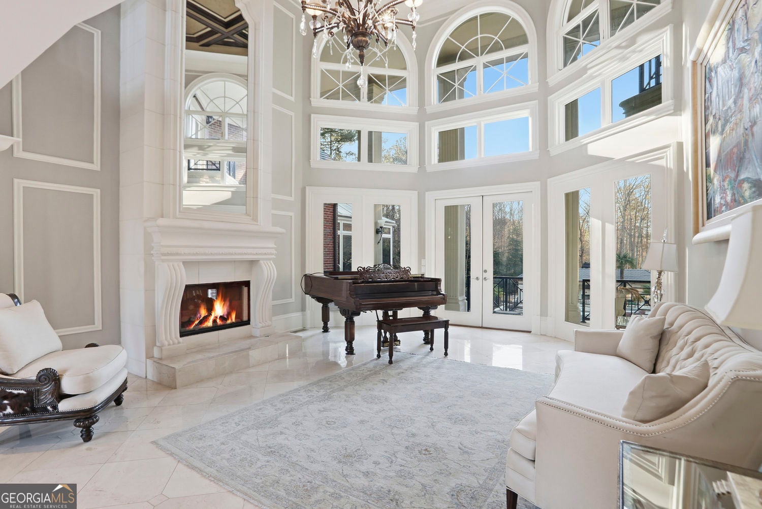 Set on 3.8 beautifully manicured acres, this elegant gated estate offe – image 82