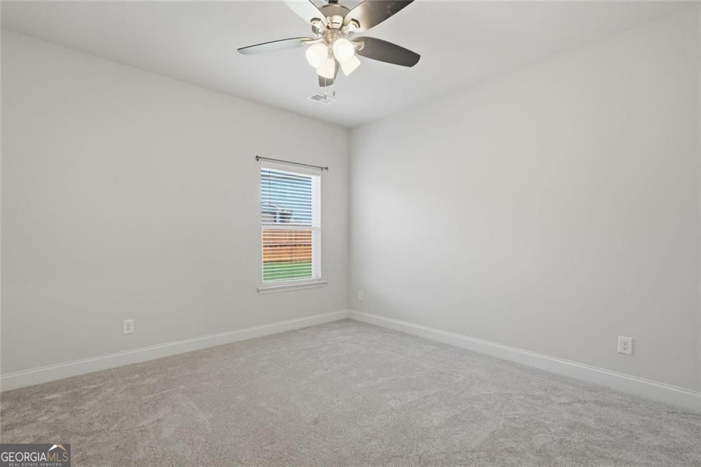 Flawlessly maintained and thoughtfully designed, this home exudes the – image 25