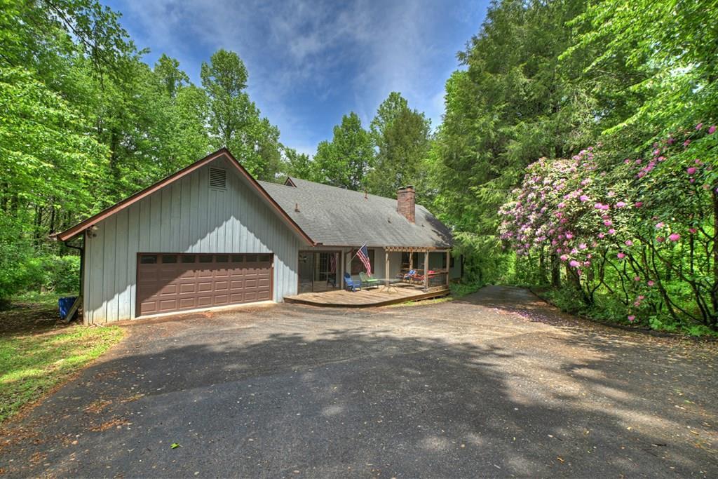 Tucked away on 2.93 private, wooded acres near the heart of Historic D – image 3