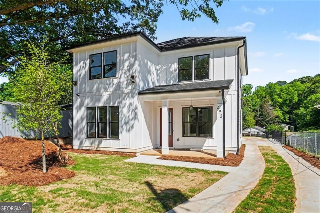 Welcome to this beautifully designed two-story home conveniently locat – image 2