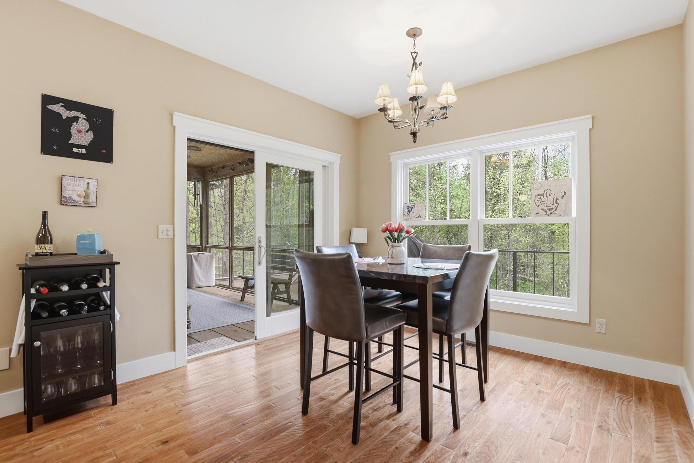 Tucked away on over an acre along the Little Muskegon River in the hea – image 21