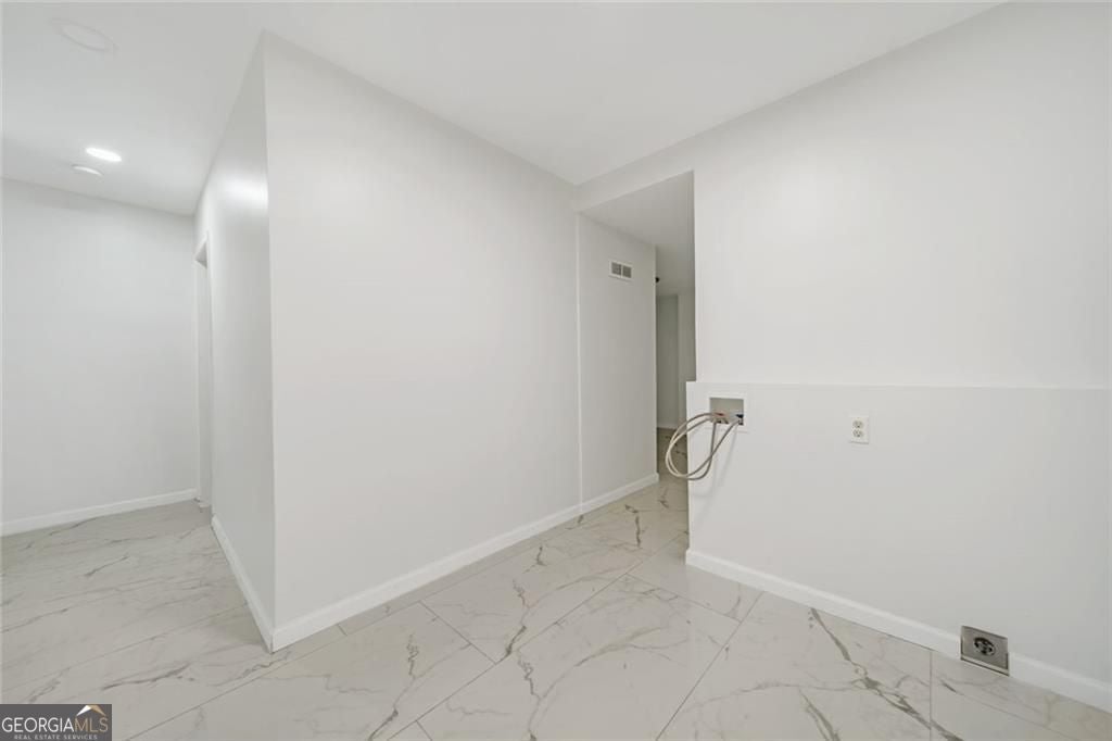 Just listed in the sought-after Arbors at Old Peachtree subdivision! T – image 24