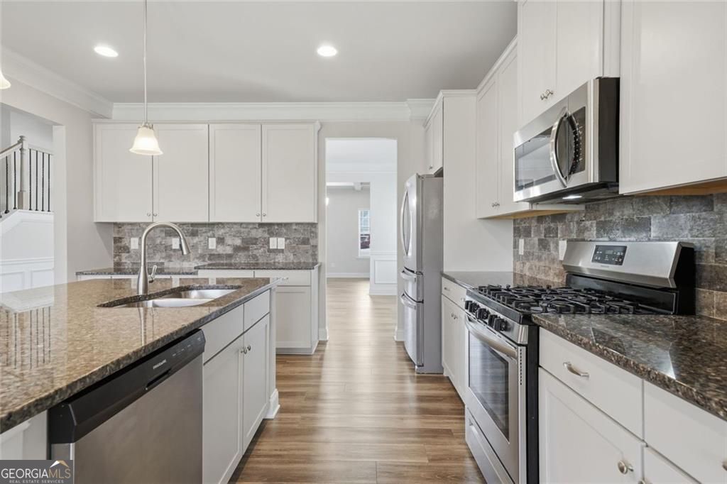 Flawlessly maintained and thoughtfully designed, this home exudes the – image 22
