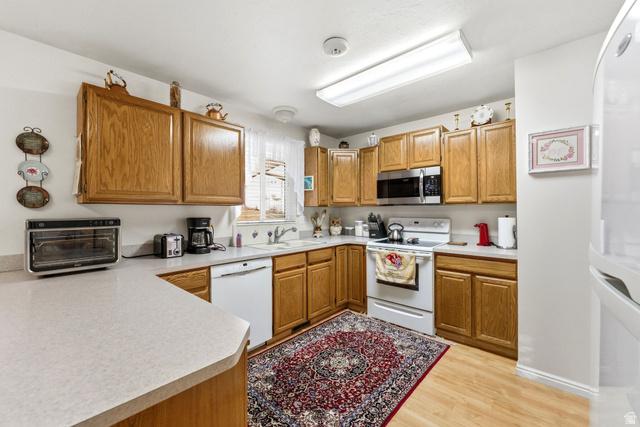 Welcome home to this beautifully well-kept East Bench gem, perfectly s – image 3