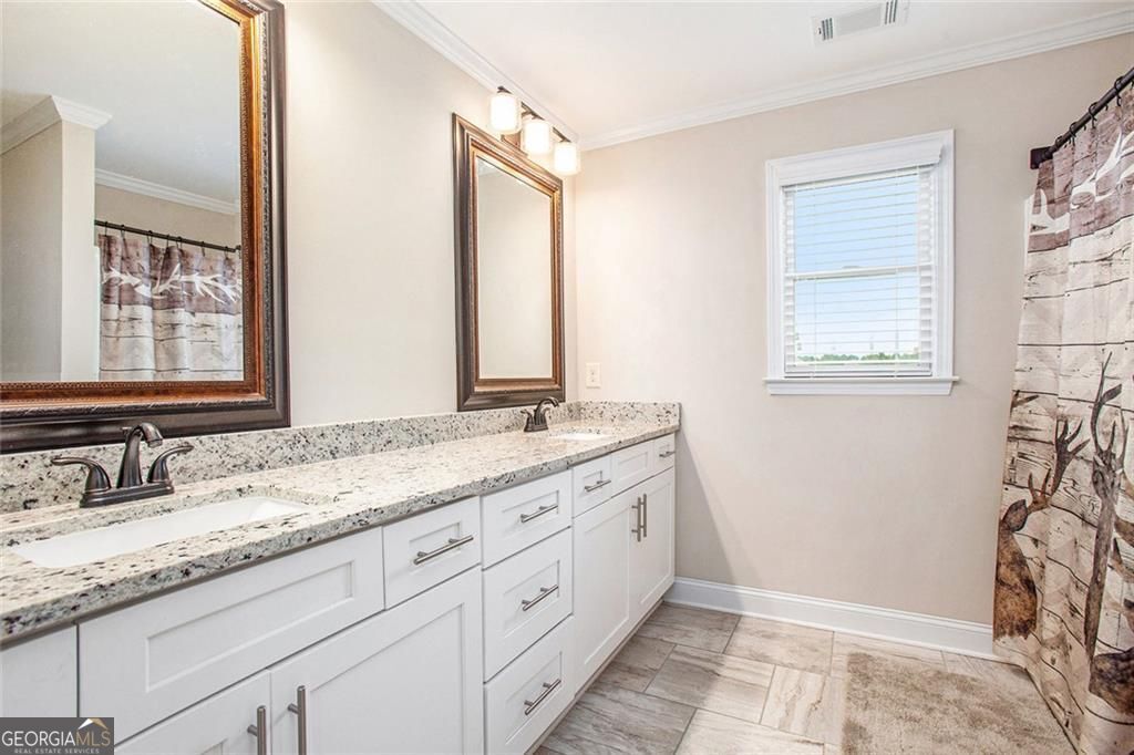 This exceptional two-story residence truly has it all, offering a perf – image 28