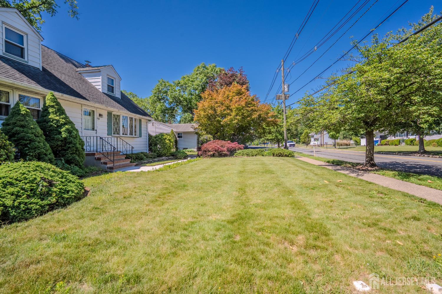 Welcome to 504 Plainfield Avenue, a charming Cape Cod home designed fo – image 33