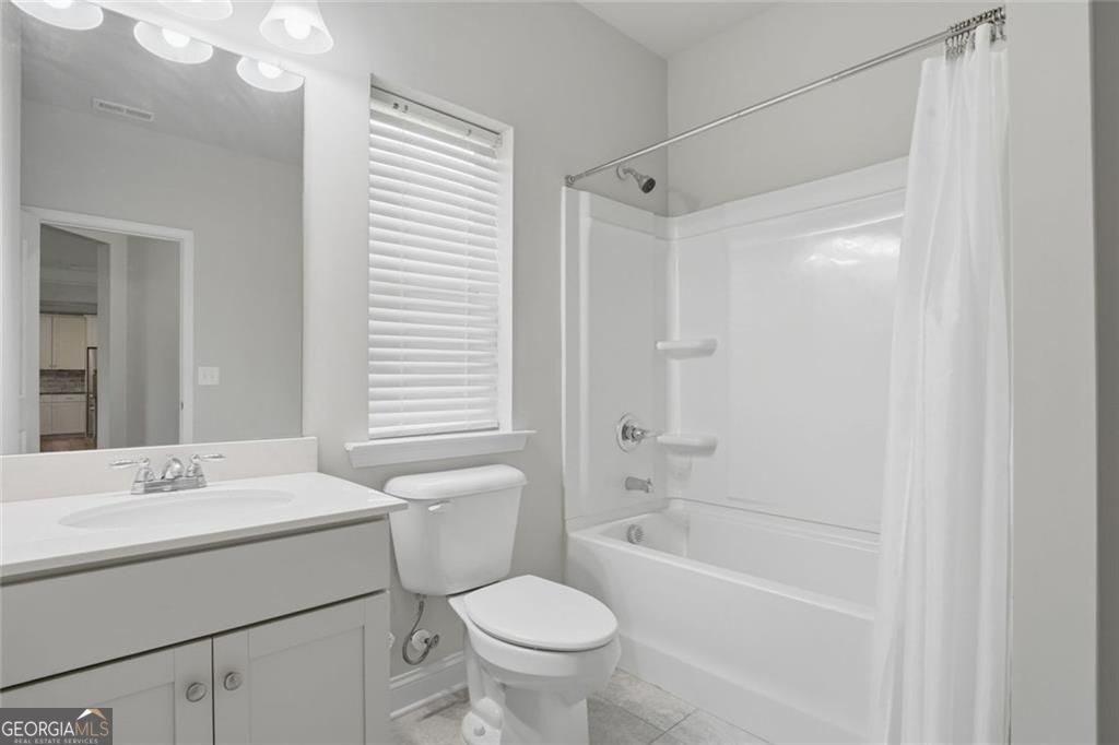 Flawlessly maintained and thoughtfully designed, this home exudes the – image 24