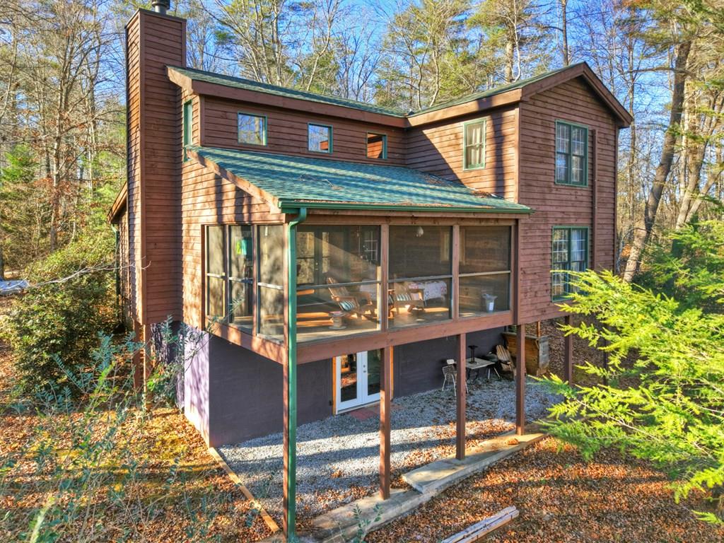 Look “Beyond the Ordinary” at this Distinctive “Furnished” Cabin which – image 1