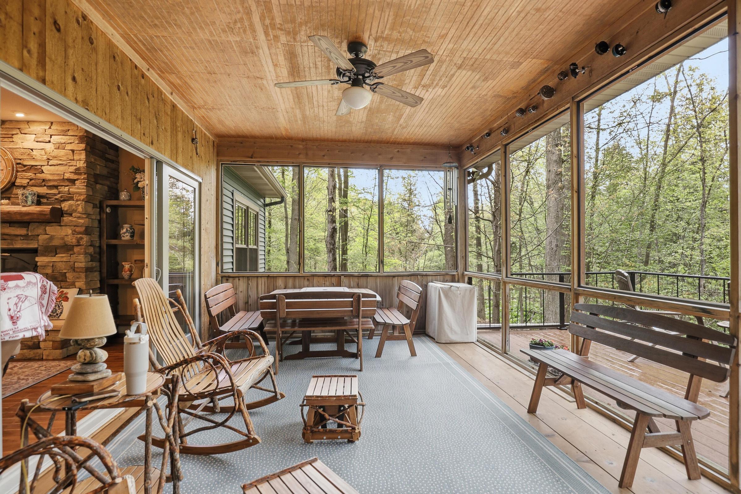 Tucked away on over an acre along the Little Muskegon River in the hea – image 24