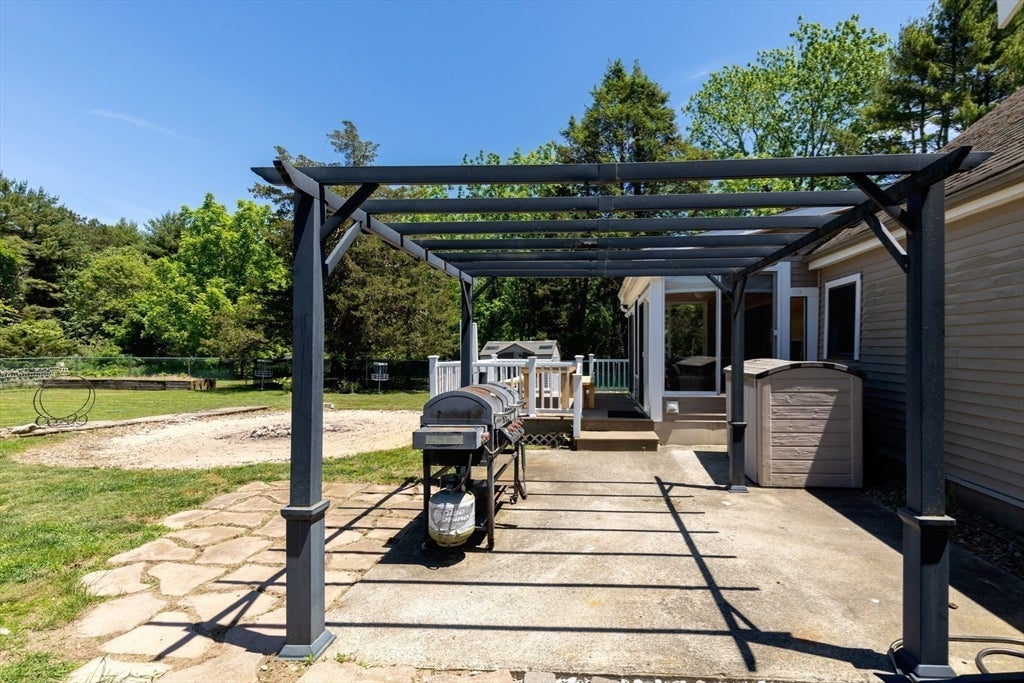 Nestled on over 2 acres, this Classic New England Cape offers the perf – image 35
