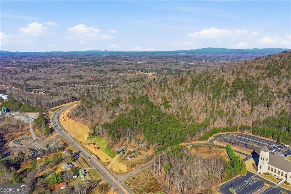 A mountain retreat in the heart of Forsyth. This extraordinary 6+ acre – image 23