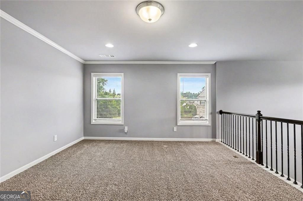 Location, location for this one, so close to the Mall of Georgia with – image 22