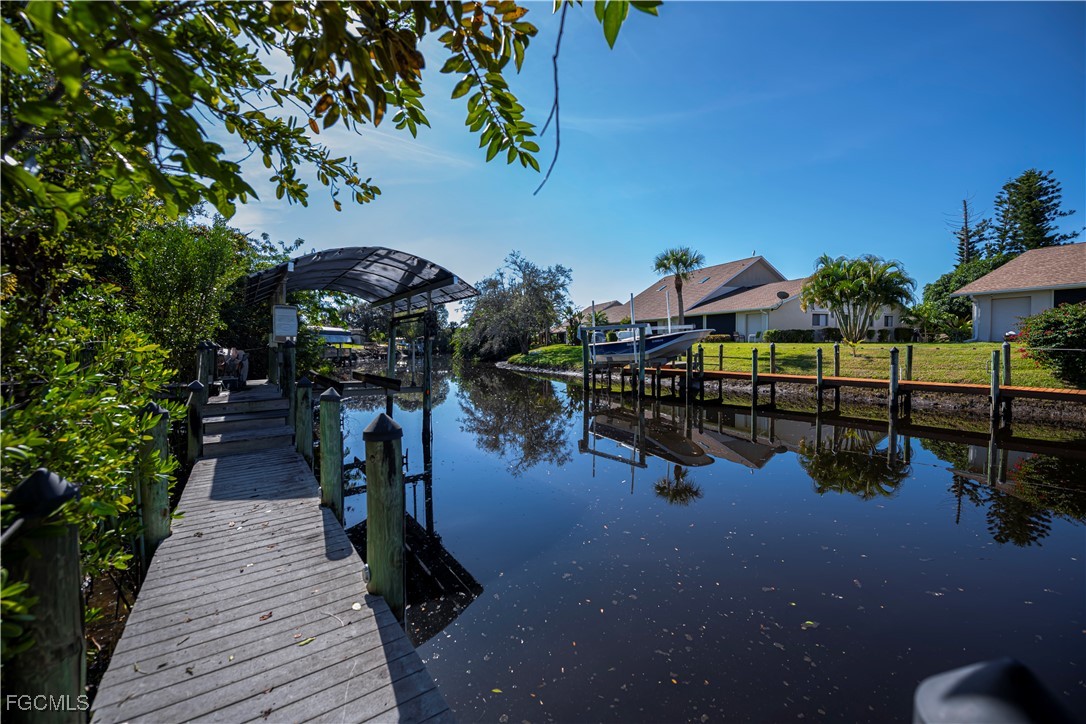 Welcome to your future GULF ACCESS HIDDEN GEM OF A home in the charmin – image 41