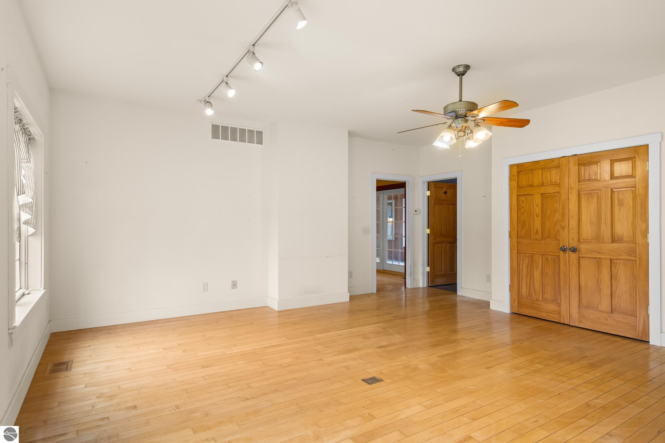 This 3-bedroom, 2.5-bath farmhouse offers a property designed for coun – image 10