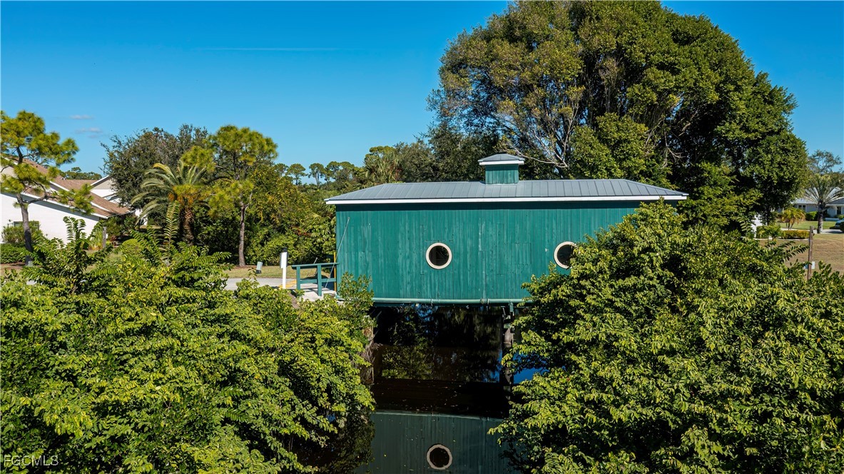 Welcome to your future GULF ACCESS HIDDEN GEM OF A home in the charmin – image 46