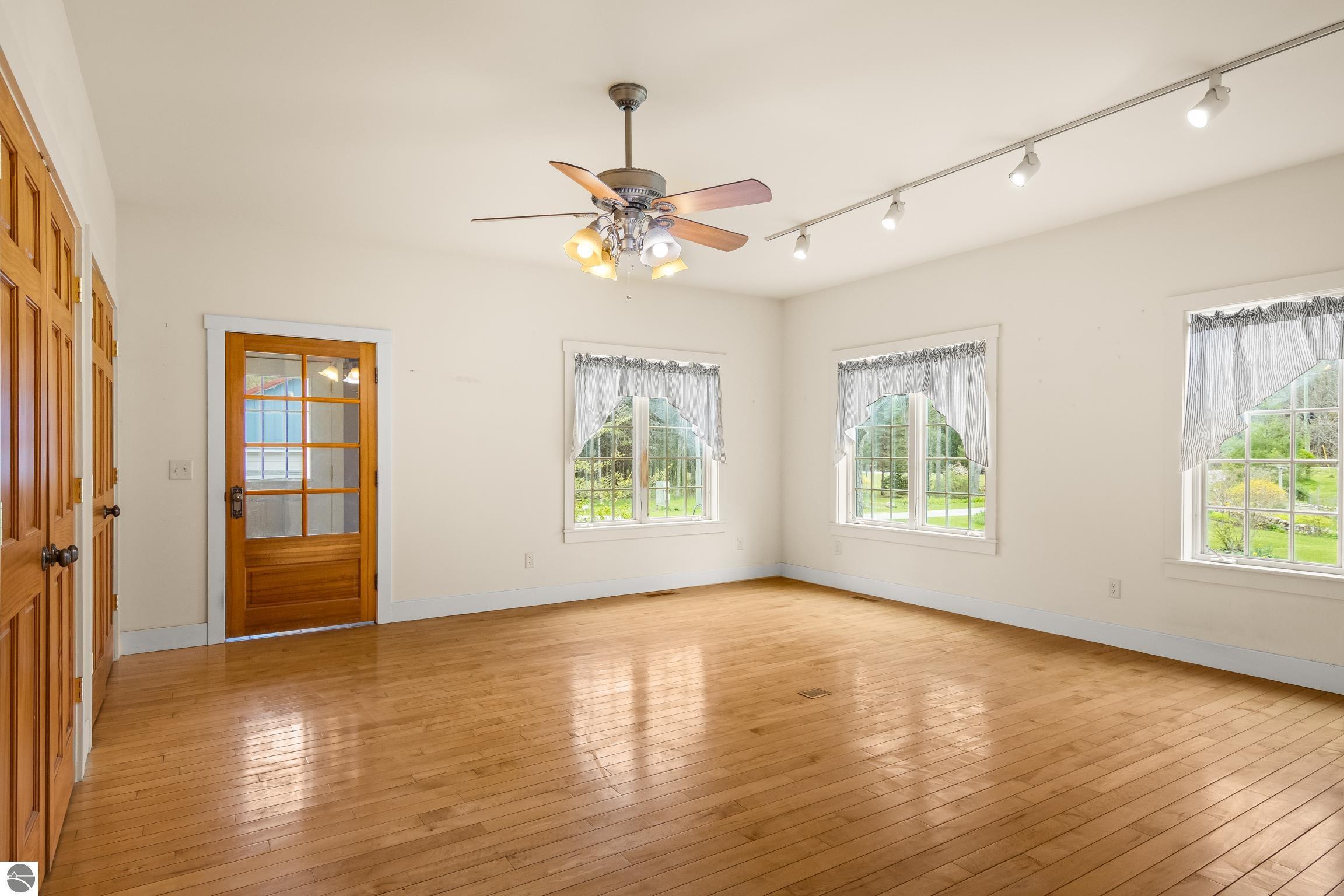 This 3-bedroom, 2.5-bath farmhouse offers a property designed for coun – image 11