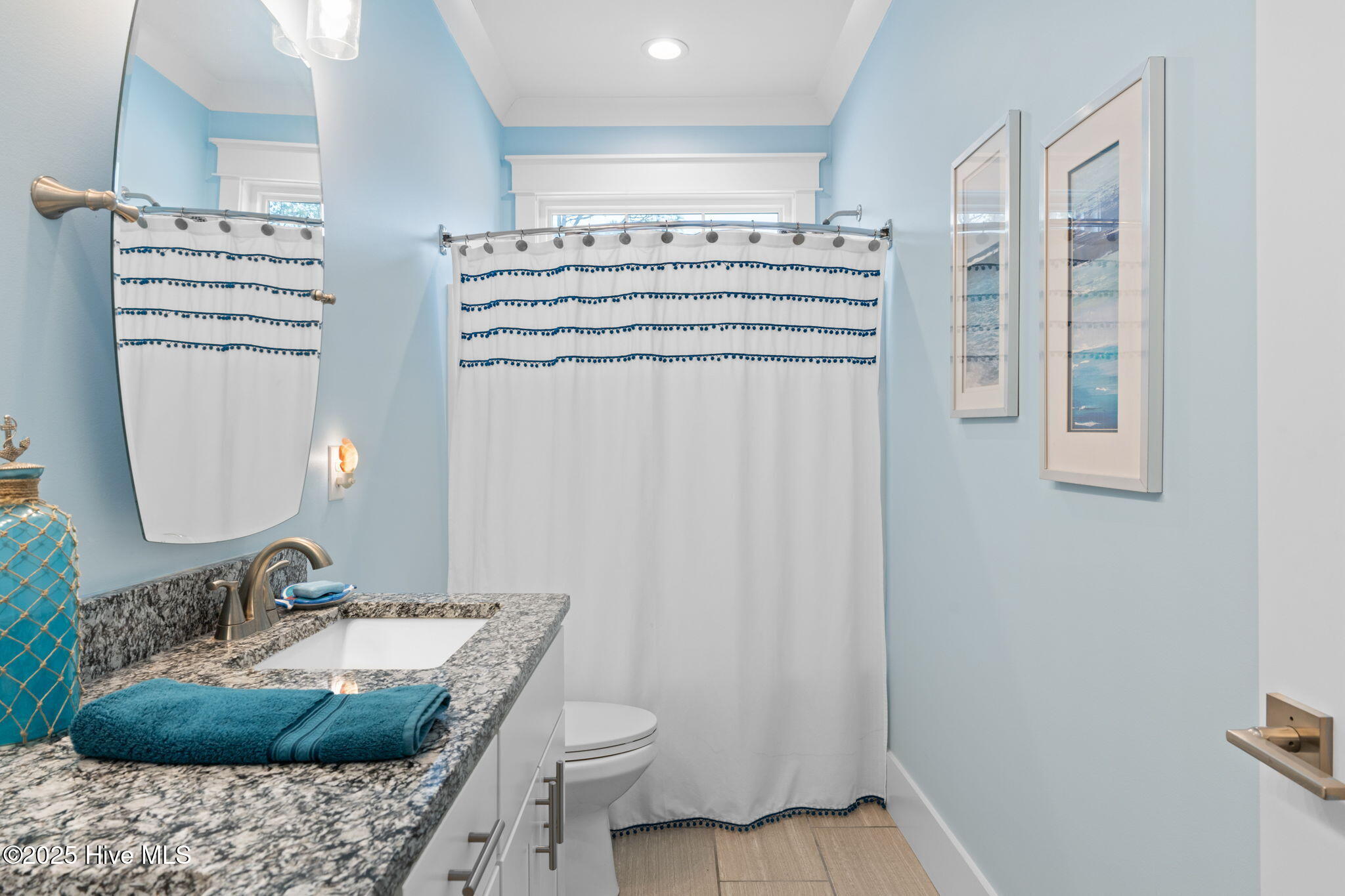 Welcome to 205 NE 59th Street, where coastal charm meets high-end craf – image 41