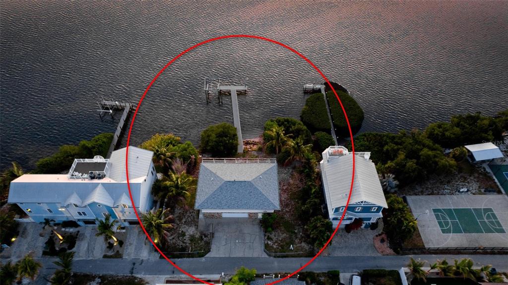 CONFIRMED POTENTIAL FOR TWO BUILDABLE WATERFRONT LOTS - This rare offe – image 5