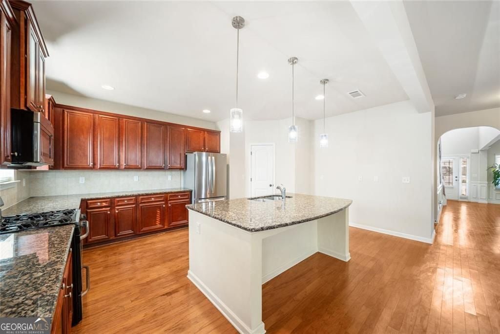 Timeless curb appeal and solid construction define this beautifully ma – image 21