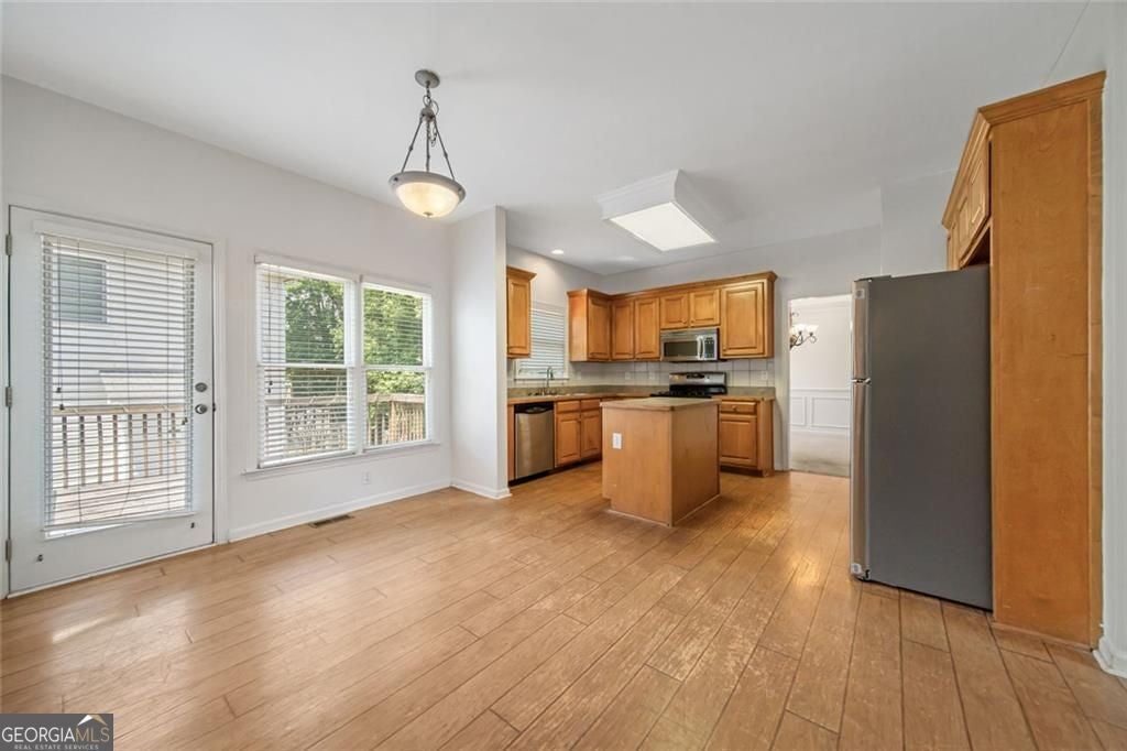 Just listed in the sought-after Arbors at Old Peachtree subdivision! T – image 12