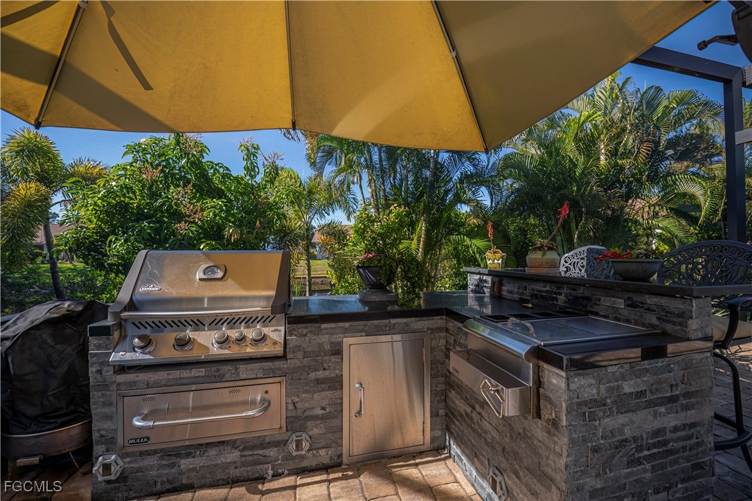Welcome to your future GULF ACCESS HIDDEN GEM OF A home in the charmin – image 33