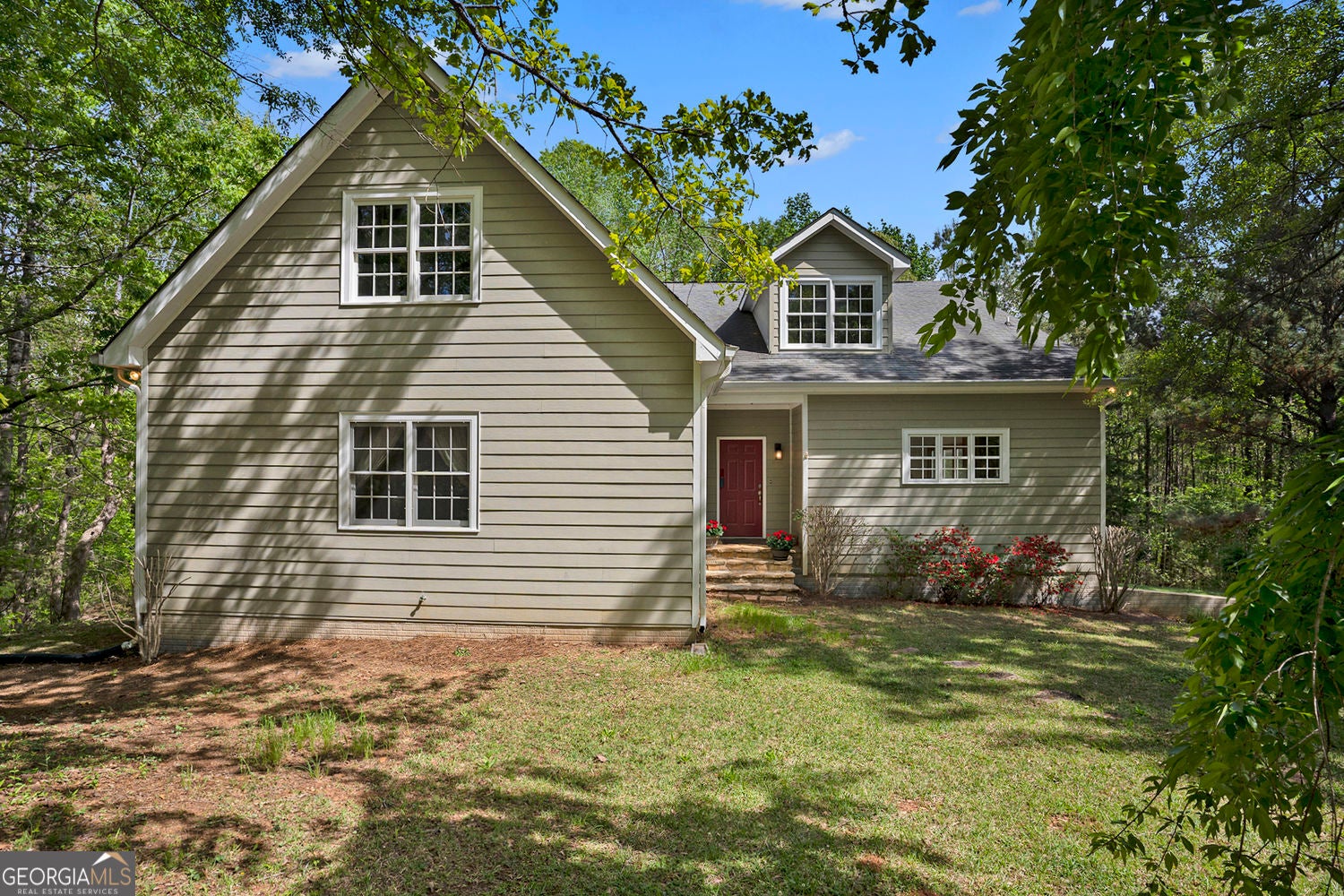 Experience the epitome of country living on this expansive 10+ acre pr – image 3