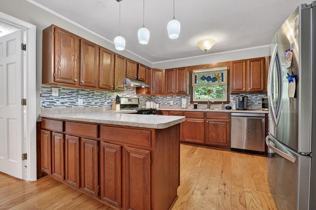 Tucked away on 2.93 private, wooded acres near the heart of Historic D – image 1