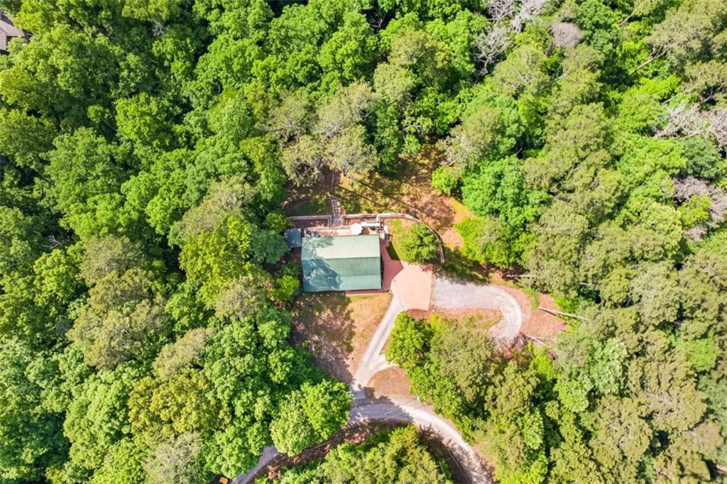 Fully furnished true log home on 5.78 private wooded acres in sought-a – image 51