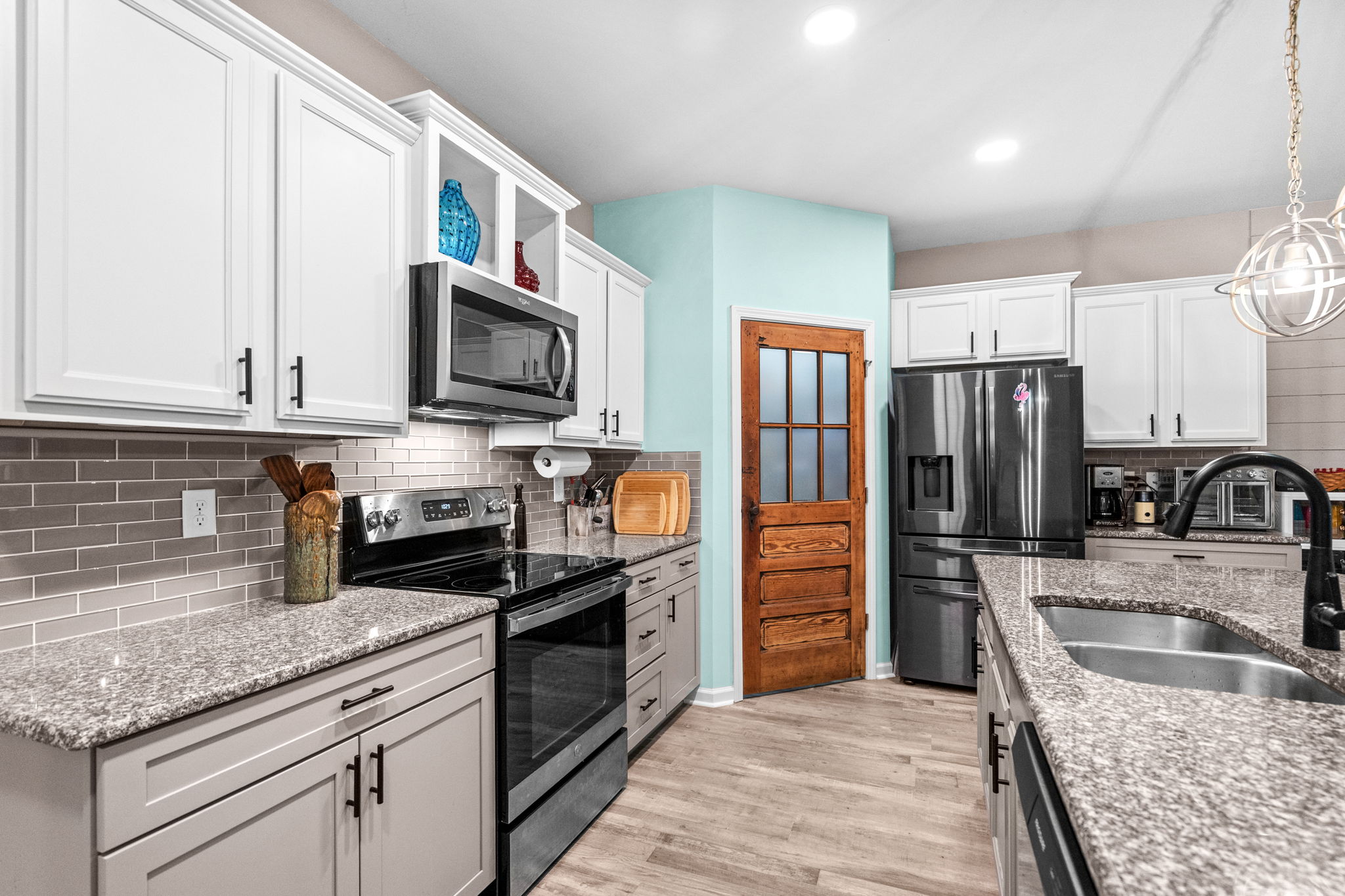 This is a beautifully maintained 4 BR/2BA one level, open concept ranc – image 23