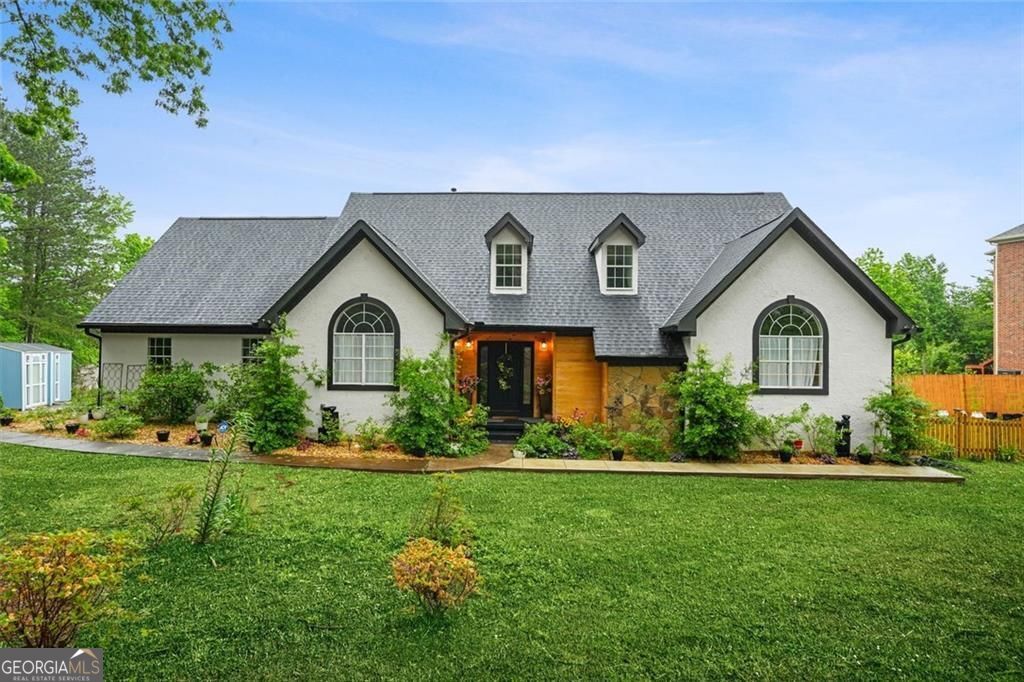 Welcome to 1229 Park Place Drive, a beautifully updated waterfront res – image 1